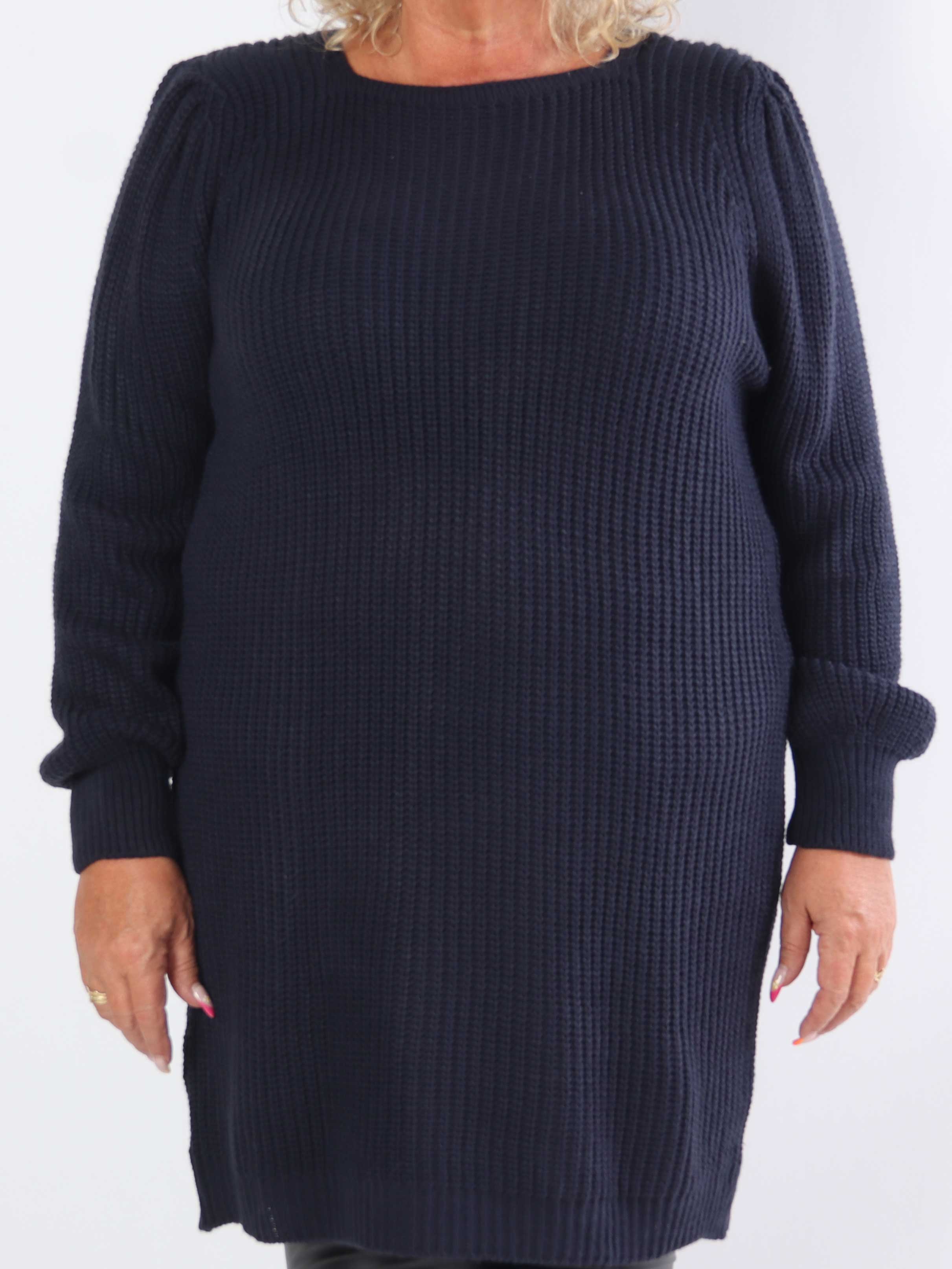 Dajana - Stickad klänning i plus size med ballongärmar